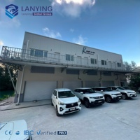 Edificio de taller de lavado de autos con estructura de acero moderna para el proyecto Seychelles Field, con oficina integrada y área de mantenimiento