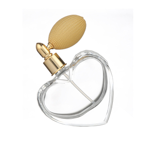 Botellas de perfume de cristal en forma de corazón transparentes al por mayor de los nuevos diseños 75ml con la bomba de aire - Product Image 1