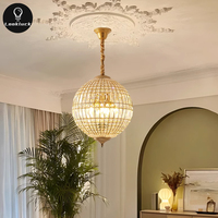 Lustre en cristal K9 de luxe moderne en verre doré à hauteur réglable Lampes suspendues de salon d'intérieur avec forme ovale et longue
