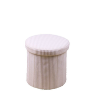 Tabouret de rangement pliable multifonctionnel le plus vendu, idéal pour organiser les objets quotidiens dans le salon.