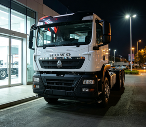 Camion lourd SINOTRUK HOWO TX 400HP économique, configuration originale complète, conduite à gauche, <span class=keywords><strong>Euro</strong></span> 2, exportation vers le Gabon, Afrique - Product Image 2