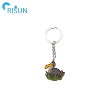 Fabrication de porte-clés en métal émaillé en forme d'oiseau Dodo, Llavero, animal sans ailes et sans peur, porte-clés Dodo souvenir, porte-clés Dodo personnalisé