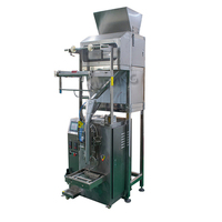 Machine à emballer quantitative automatique d'échelle à deux têtes d'acier inoxydable à vendre/échelle de granule de doseur de remplissage de grain de 10g -2000g