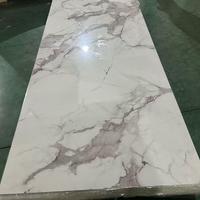 Film d'impression haute brillance à prix de gros, panneau mural en PVC, feuille de marbre, revêtement UV pour décoration intérieure, fond de télévision