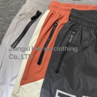 Short en nylon réfléchissant à impression graphique personnalisée double couche sans couture Spandex Shorts en nylon de sport athlétique pour hommes