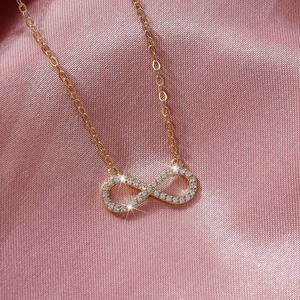 Collana con ciondolo a cuore con nodo dell'infinito e zirconi per donna, elegante catena a clavicola, gioielli alla moda - Product Image 1