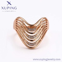 Ensemble de bijoux fantaisie XUPING en or rose avec cristaux ondulés, bague et boucles d'oreilles, style Art Déco, pour un usage quotidien