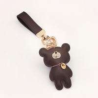 Porte-clés de luxe en cuir PU marron, petit porte-clés Bling, ours, avec pompon, vente en gros