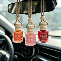 Diffuseur de parfum pour voiture en verre à suspendre, pendentif pour rétroviseur, désodorisant multi-parfums, ornement de parfum d'intérieur automobile
