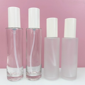 Flacon en verre rond avec bouchon pulvérisateur plat 20ml 60ml 100ml Flacon de parfum transparent mat pour cadeau et lotion - Product Image 1