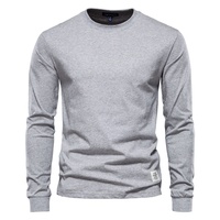 Nouveau T-shirt Homme Couleur Unie Décontracté Manches Longues Coton Pur Col Rond Polyvalent Printemps Automne Blanc Épais