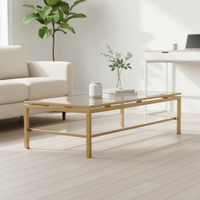 Table basse MARCEAU, choix entre un design carré ou ovale avec plateau en verre transparent et base en métal doré, luxe moderne pour le salon