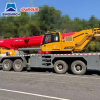 Prix d'usine Grues de levage hydrauliques 100 tonnes Grue mobile sur camion STC1000C7-8 Grues de camion d'occasion pour Sany