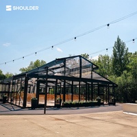 Tente de mariage d'extérieur de luxe transparente pour 200 à 500 personnes, structure en aluminium noir et verre, pour cérémonies et événements