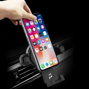 Support de téléphone universel créatif en ABS pour voiture avec rotation à 360° et navigation par gravité pour grille d'aération - Product Image 1