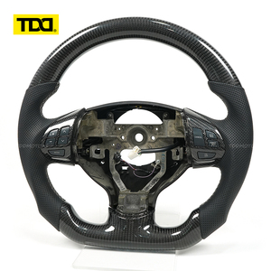 พวงมาลัยคาร์บอนไฟเบอร์สีดำ TDD สำหรับมิตซูบิชิ - Product Image 1