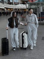 2024 femmes décontracté deux pièces ensemble à manches longues à capuche élastique pantalon Style de rue coupe ample motif solide pour l'automne