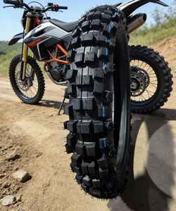 Neumáticos de motocicleta personalizados de fábrica 100/100-18 con alambre de seguridad, resistentes al calor, para aventuras <span class=keywords><strong>en</strong></span> circuitos de ceniza volcánica. - Product Image 1