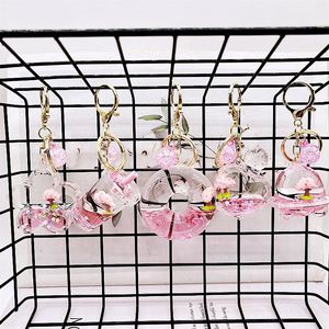 Porte-clés dessin animé cerisier et beignet, porte-clés liquide sable mouvant Sakura, pendentif de voiture, accessoires de sac, cadeaux pour enfants - Product Image 2