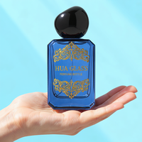 Vente en gros de flacons de parfum rectangulaires biseautés personnalisés de 50 ml avec bouchon en forme de galet irrégulier, logo personnalisé OEM disponible
