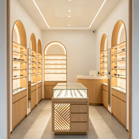 Vitrines d'exposition LED personnalisées pour lunettes, comptoirs de magasin d'optique, stations d'expérience en îlot central de centre commercial et vitrines d'exposition