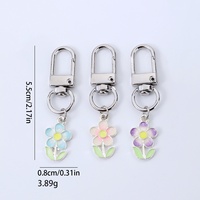 Pendentif de sac double face coloré à motif floral pour femme, porte-clés en alliage de zinc, cadeau de vacances pour enfant, pendentif de sac ou de clés de voiture