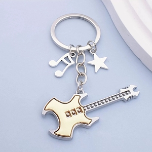 Nuevo llavero de guitarra musical de dos tonos con colgante de pentagrama para bolsos y llaves de coche - Product Image 3