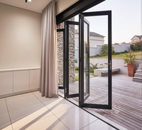 Porte coulissante double vitrage en aluminium isolée, moderne et personnalisée, pour terrasse et jardin extérieur