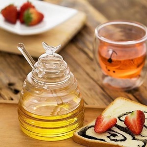 Frascos de Vidrio Reciclables y Ecológicos Personalizados para Miel con Tapa de Rosca y Cuchara en Tamaños de 500 ml y 700 ml para Aceite de Oliva y Leche - Product Image 1