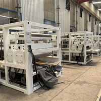 Machine automatique de débavurage et de arrondissement des bords pour la fabrication de tôles métalliques