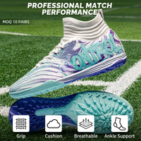 Chaussures de football de haute qualité en gros, dotées de crampons respirants en mesh et amortissants, conçues pour la performance des athlètes professionnels.