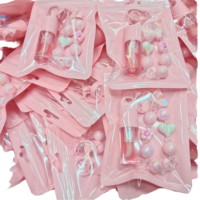 Huile à lèvres repulpante hydratante brillante waterproof longue tenue pour usage quotidien, marque privée sans logo, avec porte-clés perlé rose, vente en gros