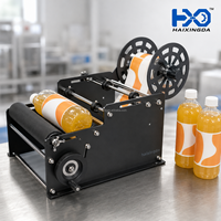 Applicateur d'étiquettes manuel de table pour bouteilles rondes de shampoing, bière, cosmétiques et canettes