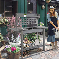 Hölzerner Garten-Blumenerde-Arbeitstisch mit verschiebbarer Tischplatte und verstecktem oberem Regal für Blumentöpfe Pflanz gefäße