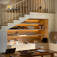Armoires d'escalier personnalisables au design moderne, idéales pour les solutions de rangement dans les salons et les bureaux