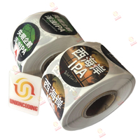 Impression personnalisée de rouleaux d'étiquettes alimentaires rondes, autocollant en vinyle adhésif imperméable avec logo pour étiquette d'emballage