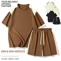 Ensemble 2 pièces en tricot gaufré personnalisé, haut à manches courtes color block et short rayé à cordon de serrage, survêtement assorti pour homme