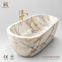 Baignoire de luxe en marbre Calacatta Viola pour villa moderne et hôtel, idéale pour une immersion relaxante de style italien.