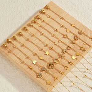 Bracelet en acier inoxydable SL249 avec mini-breloques délicates étoile, lune, cœur, <span class=keywords><strong>arbre</strong></span> <span class=keywords><strong>de</strong></span> <span class=keywords><strong>vie</strong></span> et coquillage, étanche, pour femme, idéal pour la superposition - Product Image 1
