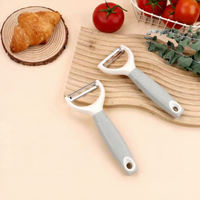 TikTok Bestseller Handmatige Fruit Schiller Drie-in-één Multifunctioneel Keukenhulpmiddel voor Fruit, Groenten en Aardappelen Schillen en Raspen