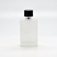 Bouteille de parfum en verre de haute qualité de 50ml vide semi-transparent noir et blanc avec bouchon en plastique conception ODM personnalisée