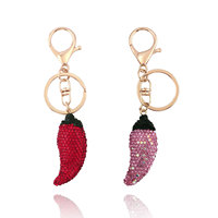 Porte-clés mignon en forme de piment en strass, pendentif pavé de cristaux, fermoir mousqueton doré, breloque de sac
