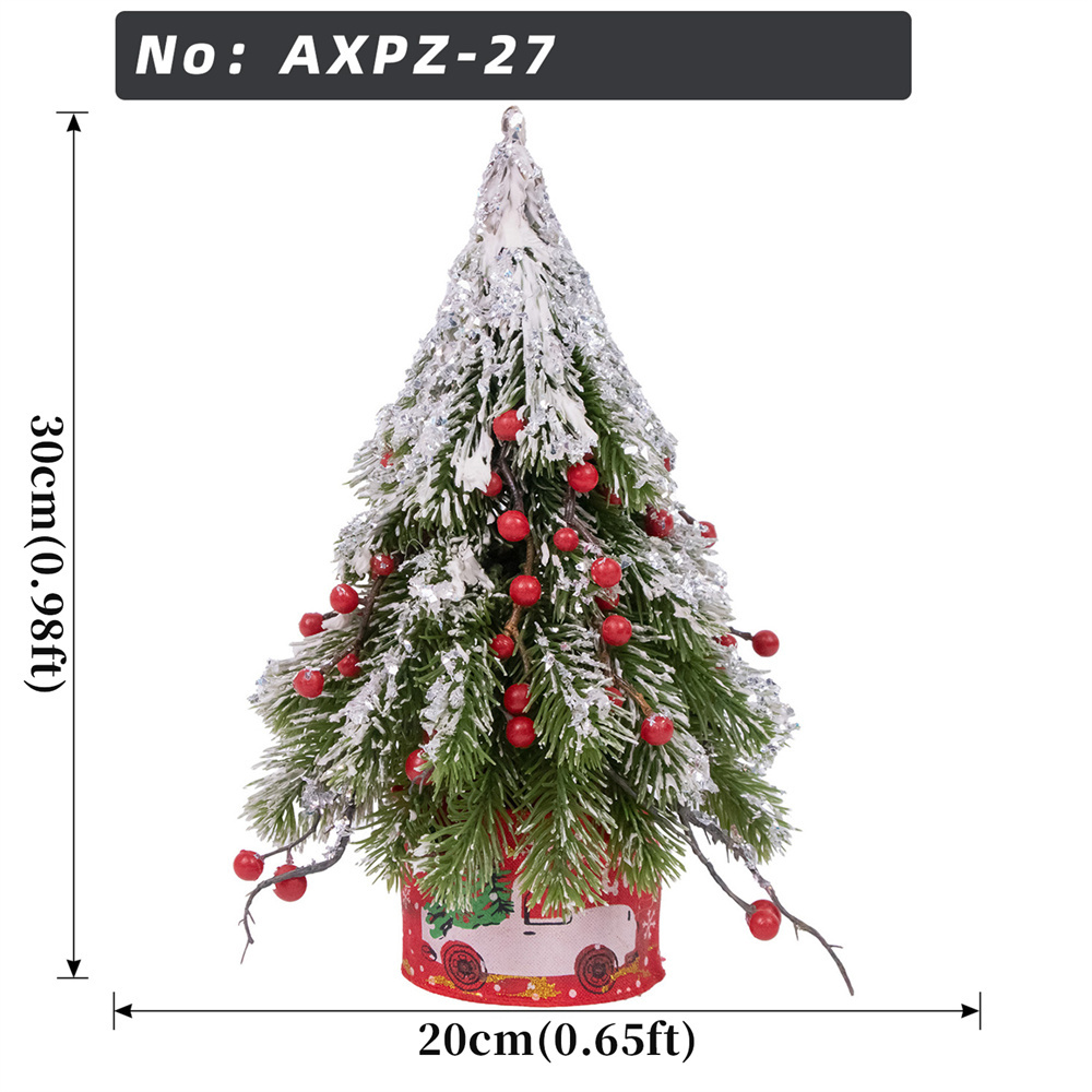 Albero di Natale innevato con bacche rosse in vaso di tessuto stampato
