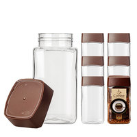 Conteneur d'emballage alimentaire carré vide en plastique PET de 480 ml (16 oz) avec bouteille de stockage de noix sérigraphiée et bouchon à vis – Vente en gros usine