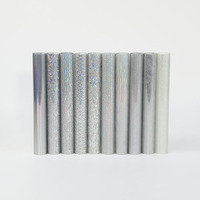 Rollo de materiales de Impresión textil de película de vinilo de transferencia de calor de TPU de alta calidad holográfica de plata al por mayor de fábrica para ropa