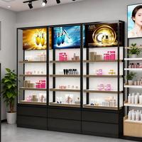 Vitrine Murale Publicitaire Lumineuse pour Cosmétiques Personnalisés – Meuble de Présentation Haut de Gamme pour Boutiques