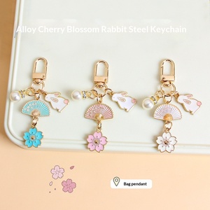 Porte-clés en alliage de zinc motif lapin fleur de cerisier, pendentif pour étui <span class=keywords><strong>AirPods</strong></span>, accessoires de décoration pour sac de <span class=keywords><strong>couple</strong></span> - Product Image 2