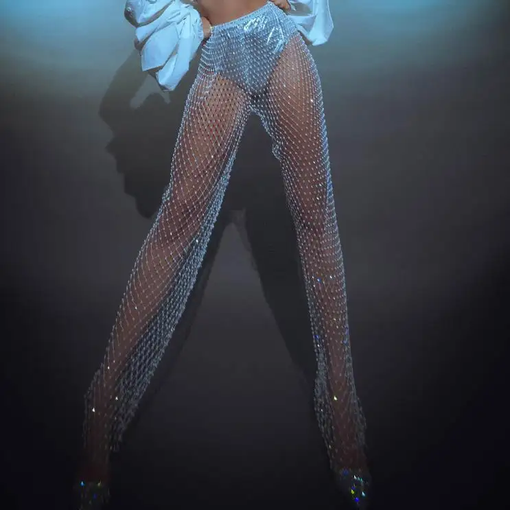 Kristal elmas parlak kadın pantolon yaz yeni moda Hollow Out Fishnet geniş bacak pantolon seksi plaj pantolon See Through
