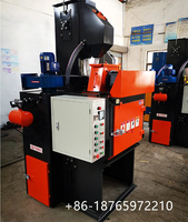 Petite machine de sablage à billes intégrée à bande de caoutchouc Q324 pour billettes d'acier avec moteur comme composant principal