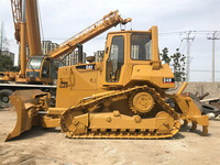 Bulldozer Caterpillar D4H d'occasion très demandé, économique, avec toutes sortes de pièces, y compris le moteur principal et les composants du moteur.